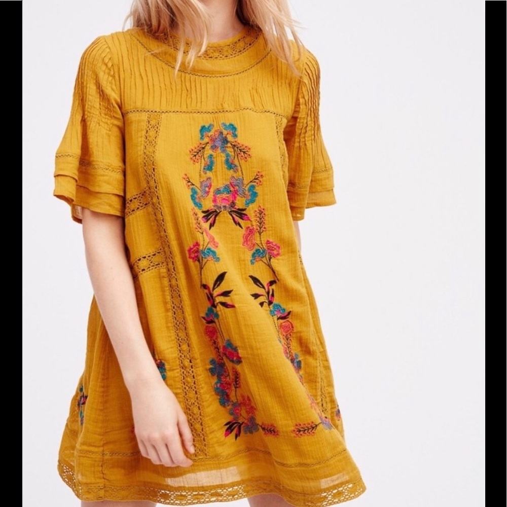 Free People mustard colored embroidered dress.
